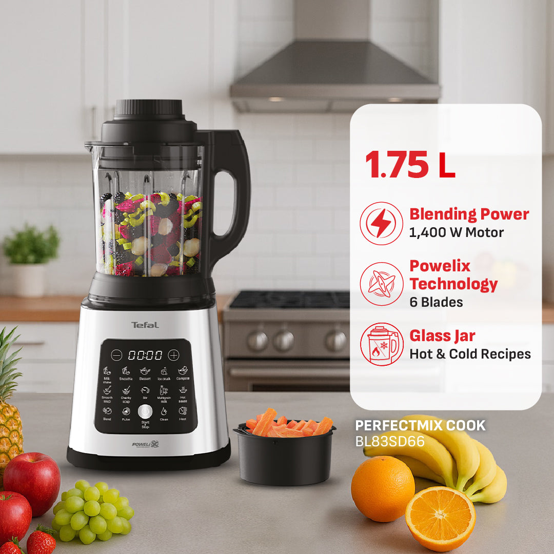 szklany dzbanek Tefal z owocami do blendowania przezroczysty szklany dzbanek blendera Tefal wypełniony pokrojonymi owocami i warzywami