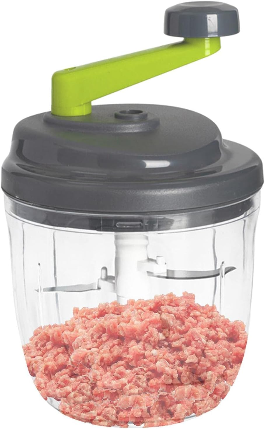 rozdrabniacz kroi jabłka na kawałki użytkownik wkłada jabłka do rozdrabniacza na drewnianym blacie