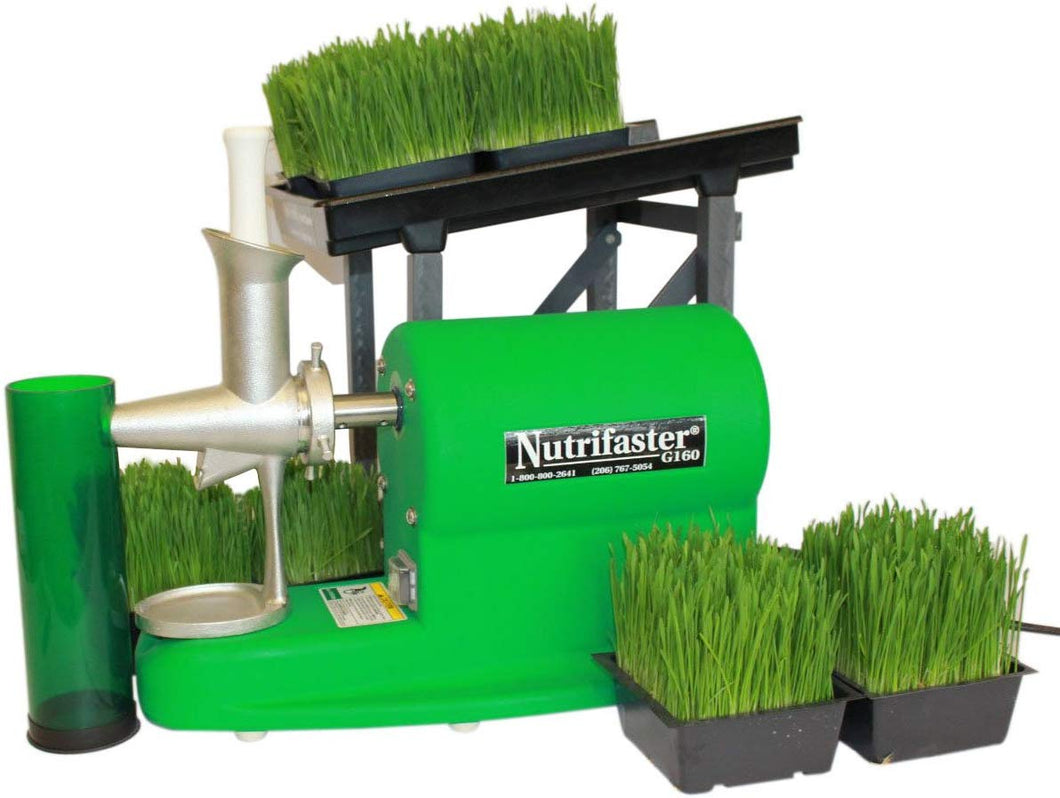 kompaktowa wyciskarka z mechanizmem dociskowym i tacą na zielony sok